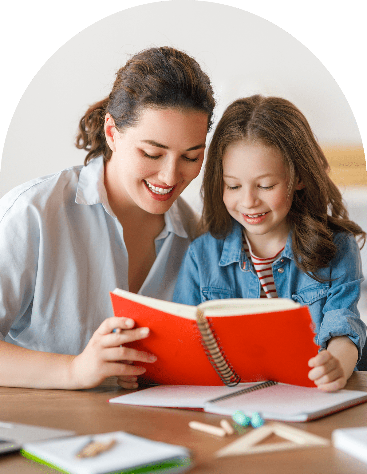 GettyImages-2161932830 (1)-3 Adult and child reading a book together.